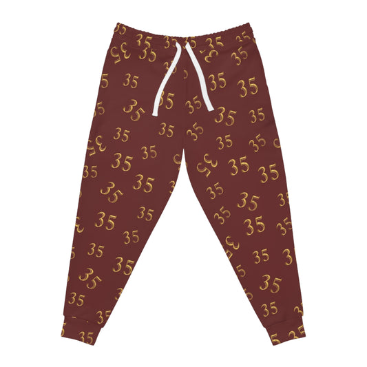 Maroon '35' All-Over Print Athletic Joggers — Gold Number Pattern